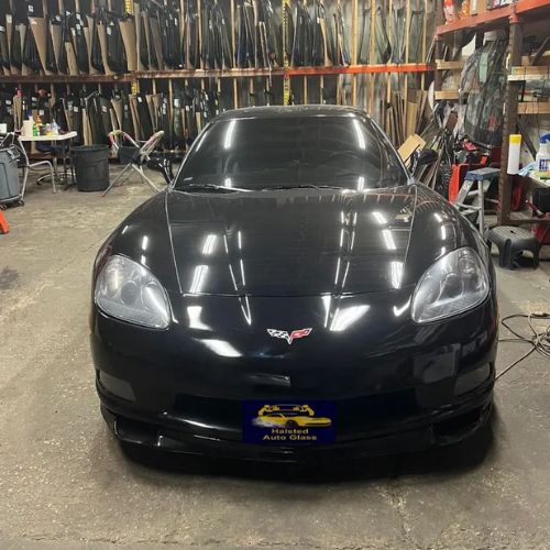 Technician performing windshield replacement in Evergreen Park, IL